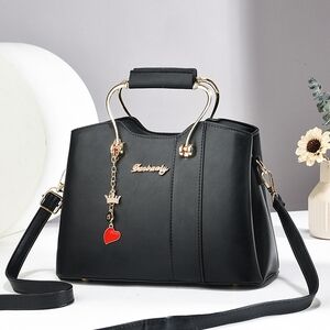 Black Handbag with Gold Accents